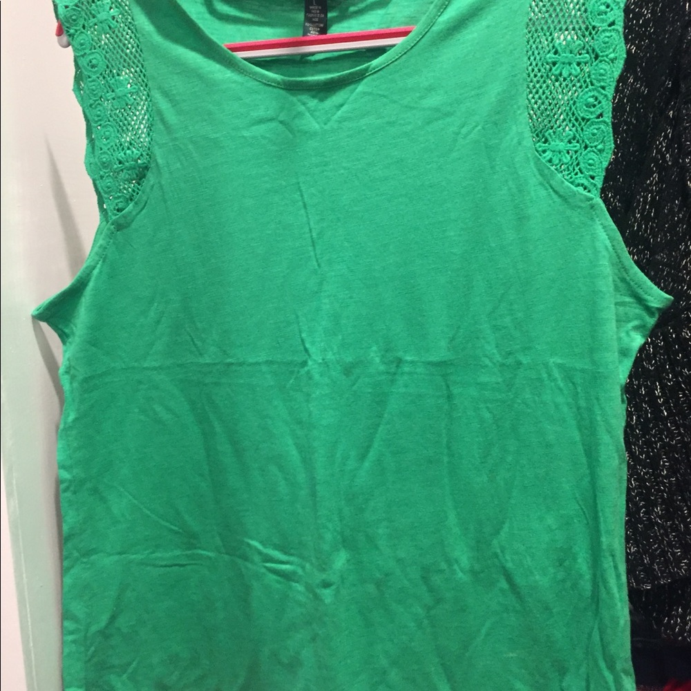 Sleeveless green cotton blouse